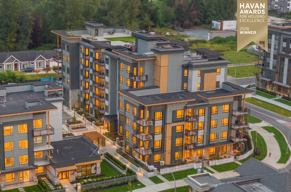 Aerial drone view of The Commons condo buildings by Zenterra Developments in Surrey, featuring a HAVAN Awards 2026 Winner badge
