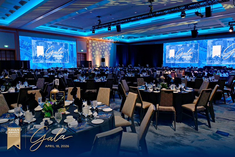 Grand banquet hall inside The Westin Bayshore set up with round dinner tables and blue accent lighting for the 2026 HAVAN Awards Gala