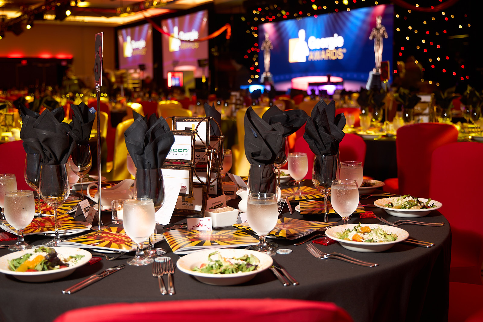 Gala dinner table setting at the Georgie Awards celebrating multi family home builders