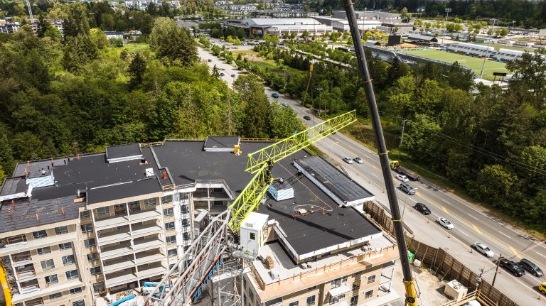 High angle crane perspective of roof construction progress at Solana condos in Willoughby Langley