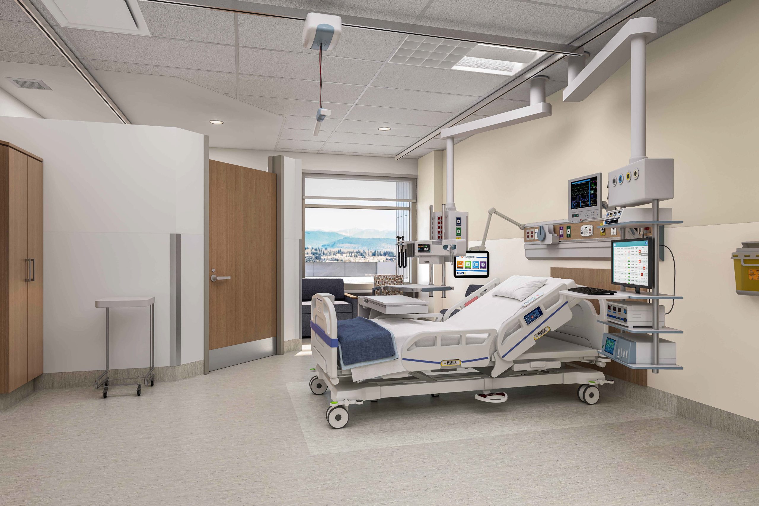 Private inpatient hospital room with smart bed technology and large window view