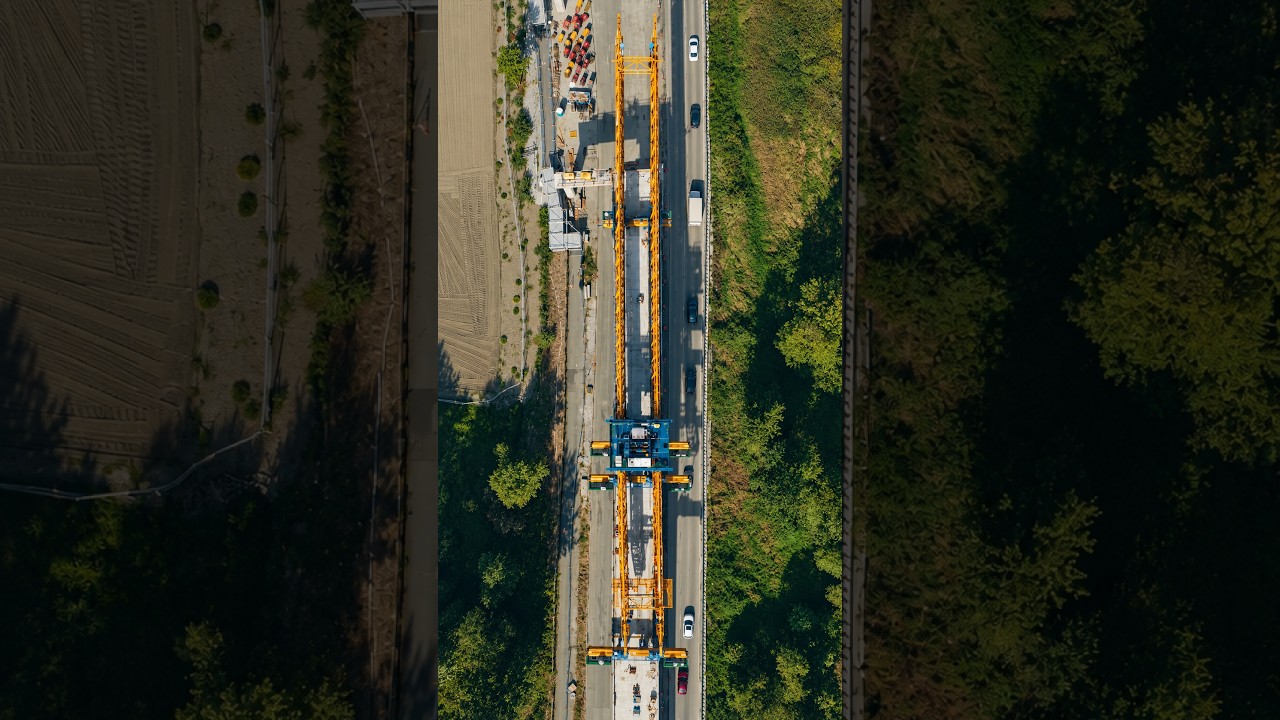 Aerial view of elevated guideway construction for the Dave Barrett Surrey-Langley SkyTrain extension in Surrey, BC